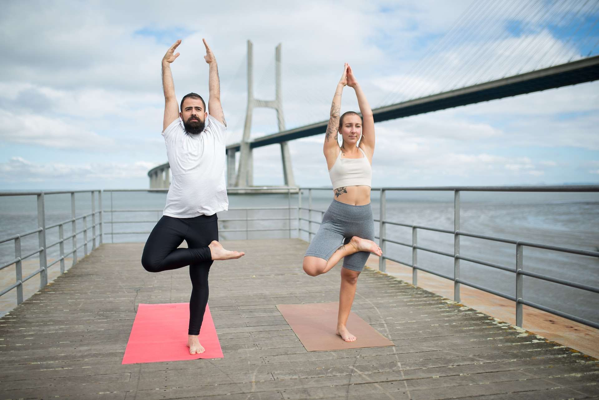 A Couple Doing Yoga Exercise together