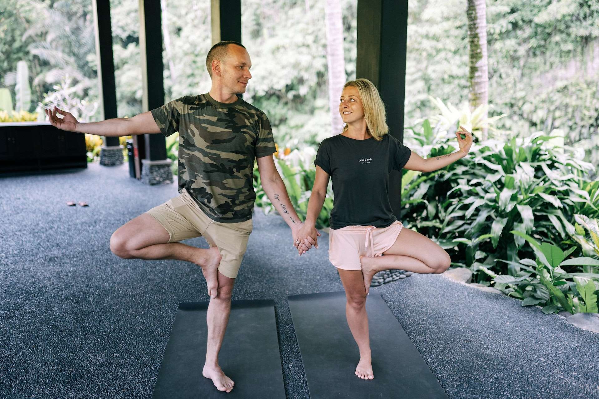 Couple Practising Yoga 