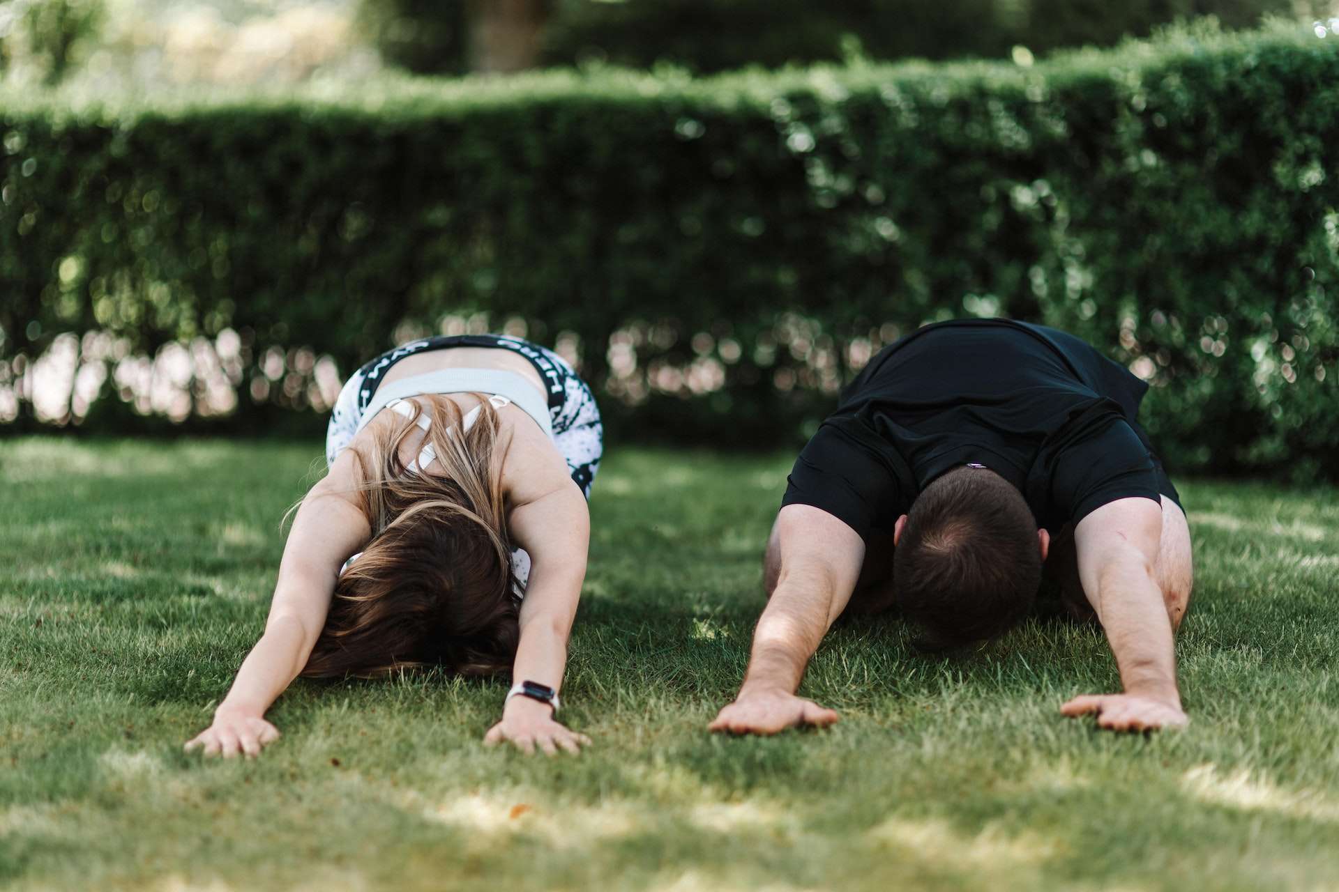 Couple Stretching their Bodies 