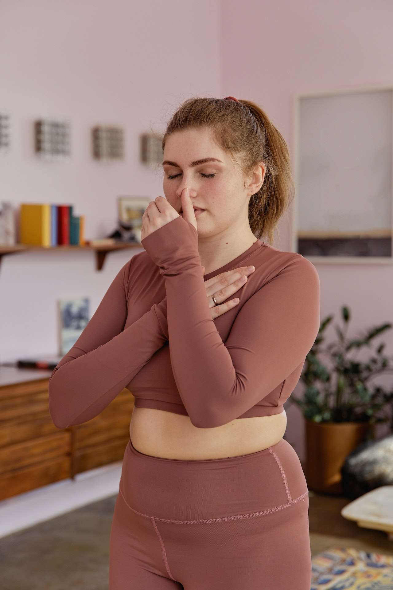 Woman Doing a Breathing Exercise
