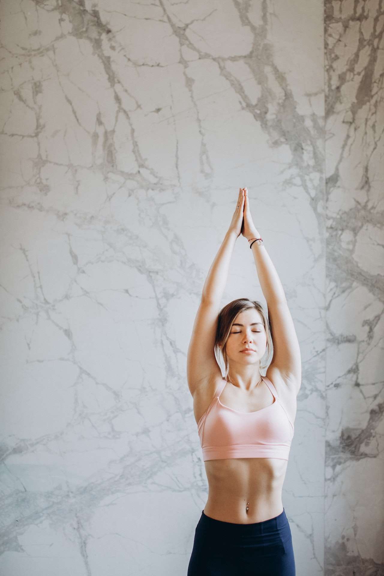 Woman Practicing Yoga for tranquility