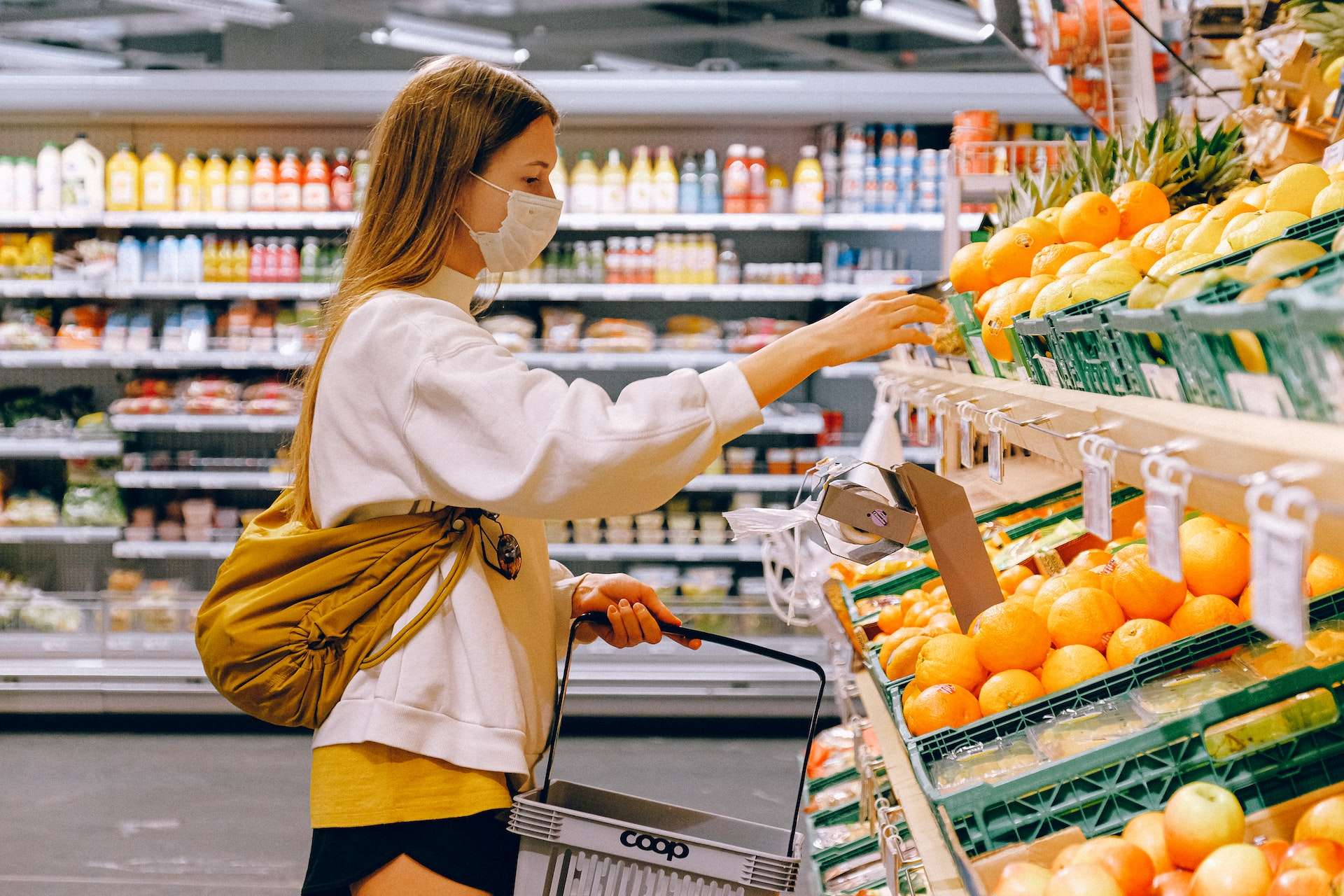 Woman in White Long Sleeve Shirt Shopping fruits
