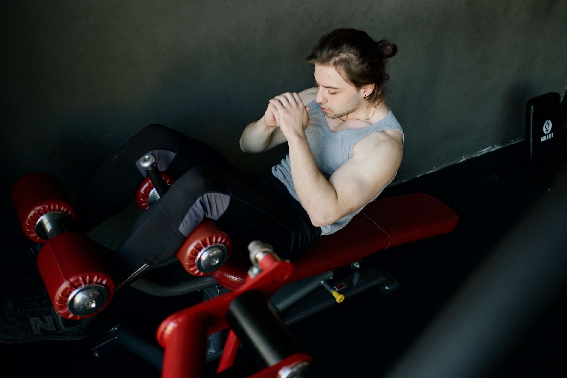 Man Exercising at a Gym
