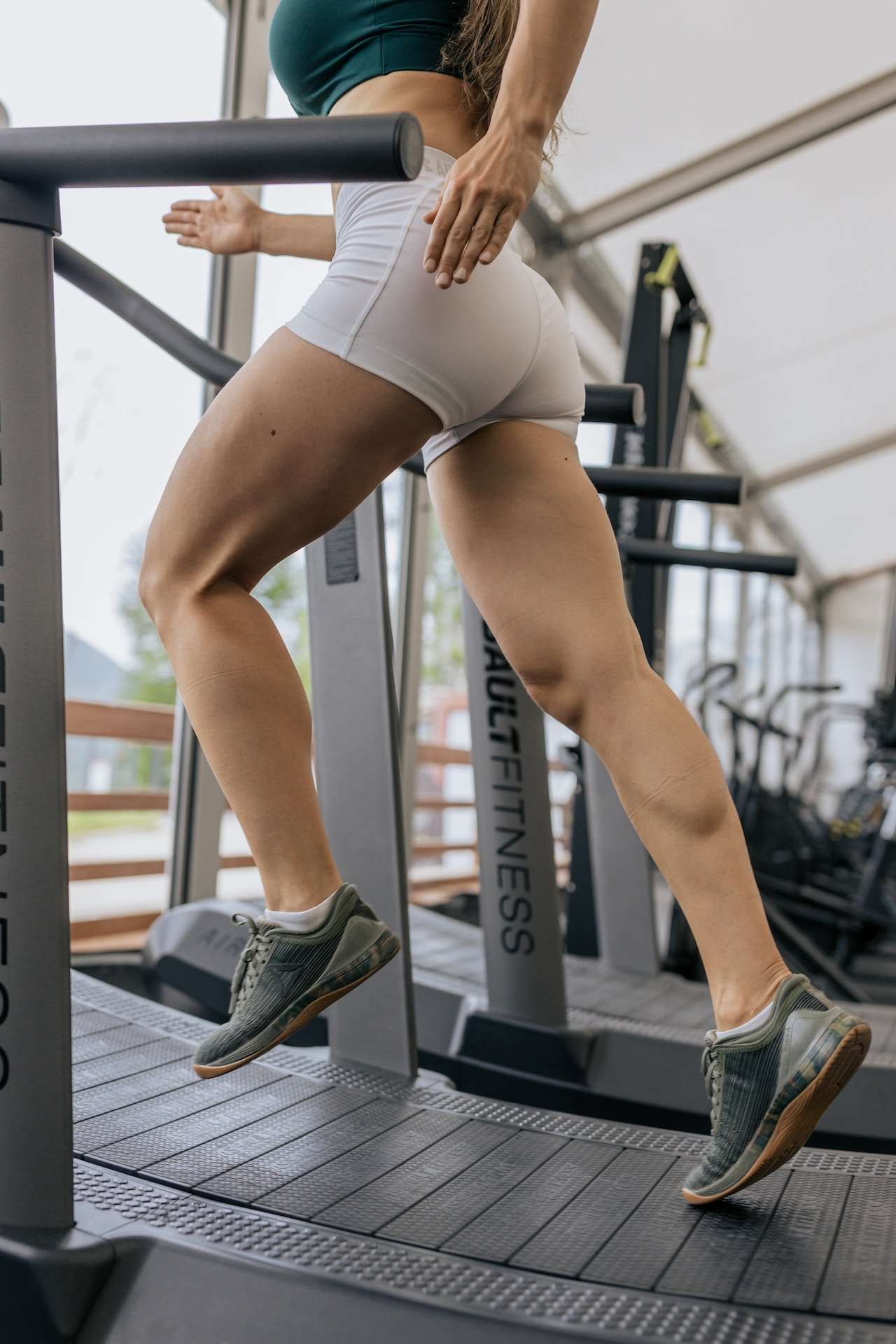 Woman Running on a Treadmill
